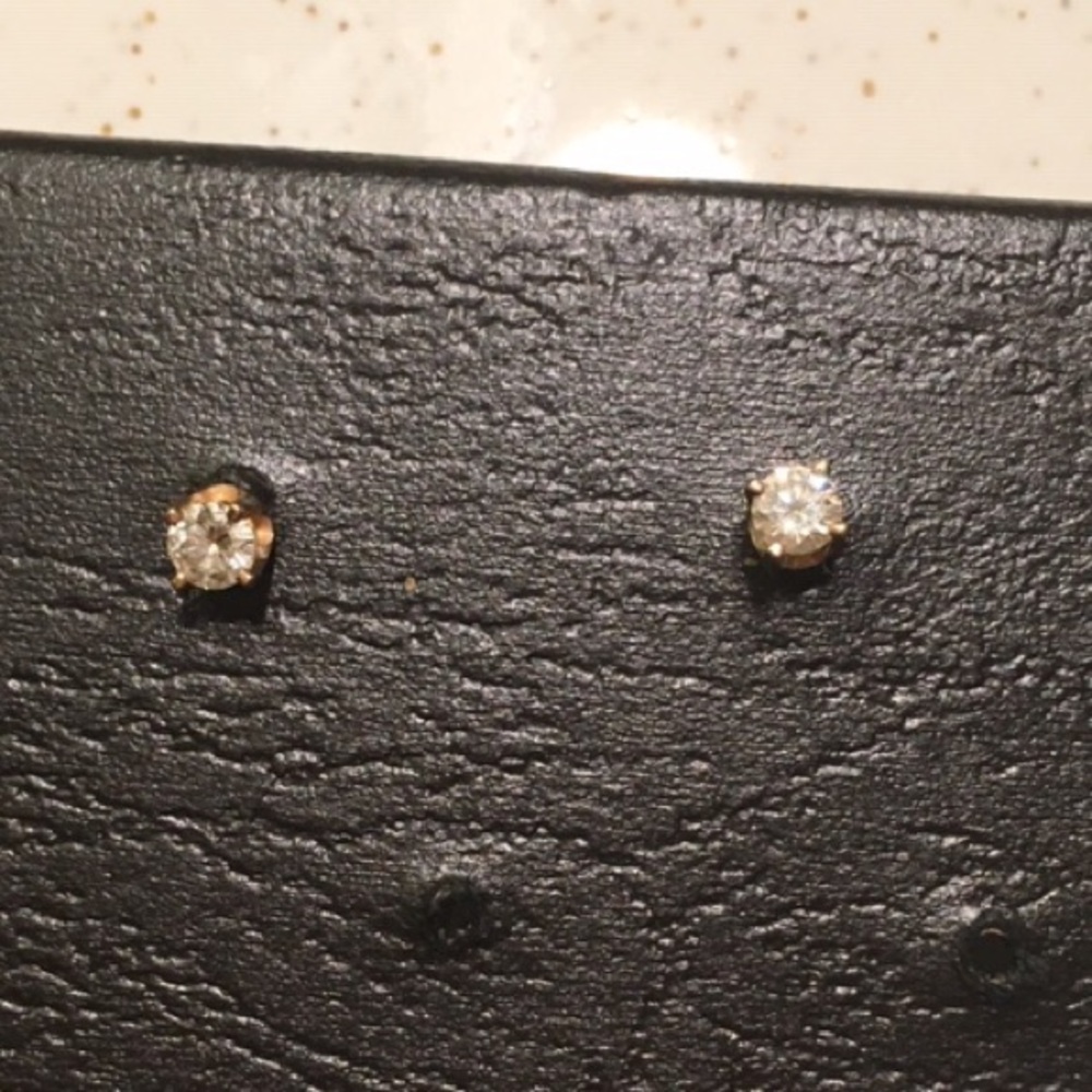 Pair of 14k Pierced Diamond Studs, .25 ct weight.
